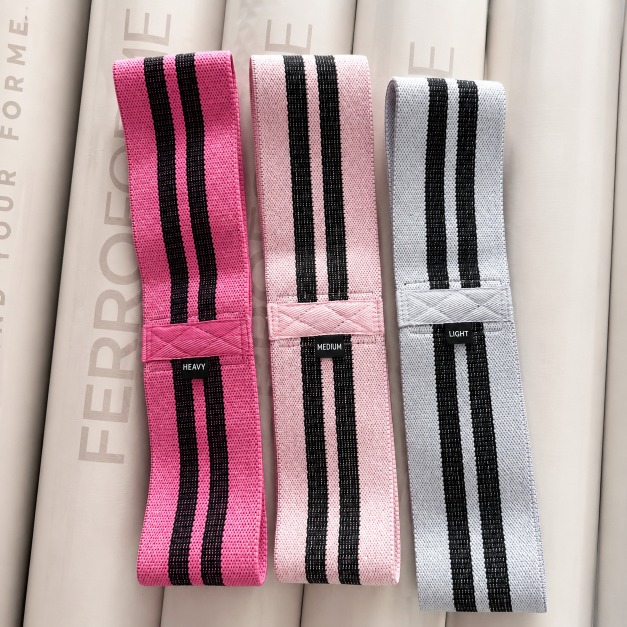 Ferro FORME Resistance Bands — light, medium, and heavy fabric hip bands