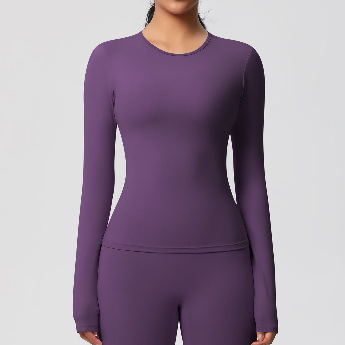 Long Sleeve Crop Top in Purple — fitted long sleeve crop with sculpted seams